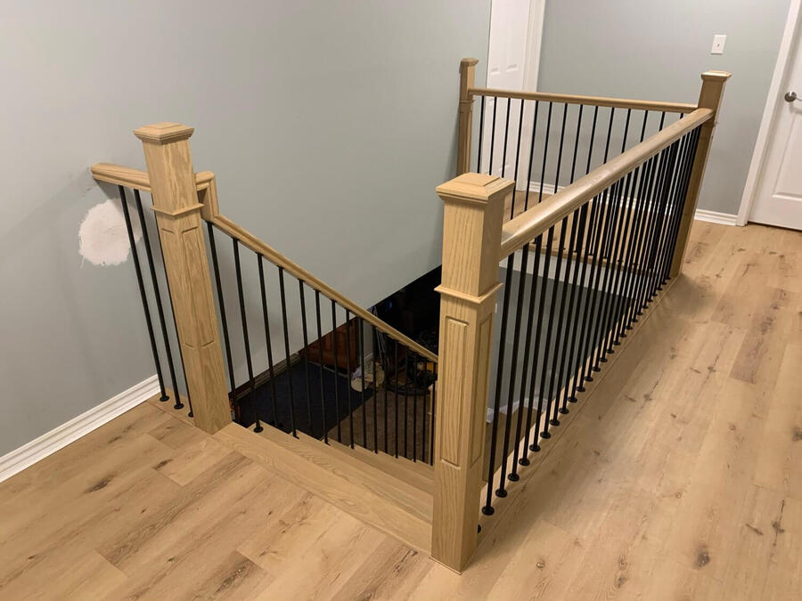 Custom hardwood staircase with wooden railings