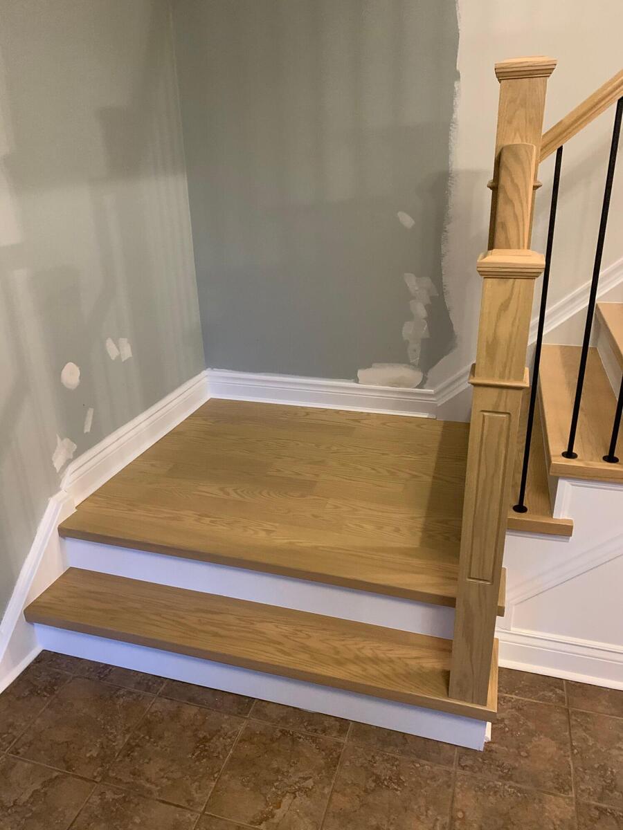 Hardwood staircase with custom railings