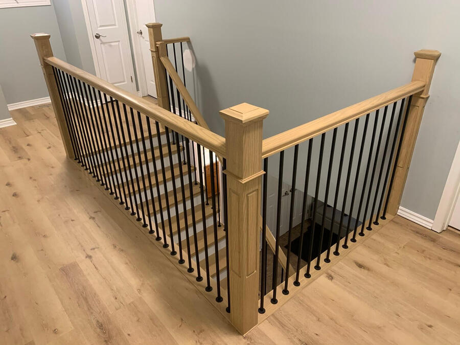 Custom hardwood staircase with wooden railings