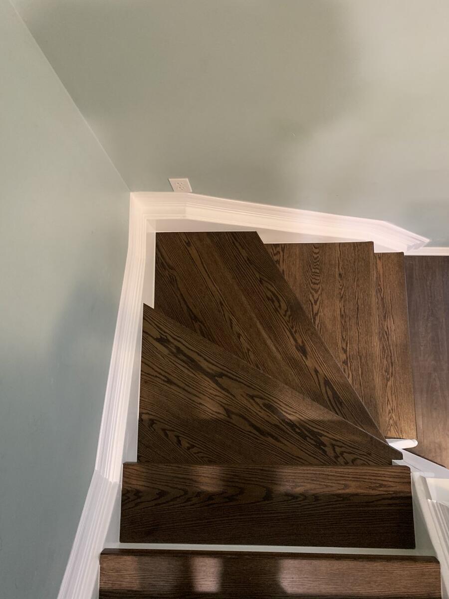 Custom hardwood staircase with wooden railings