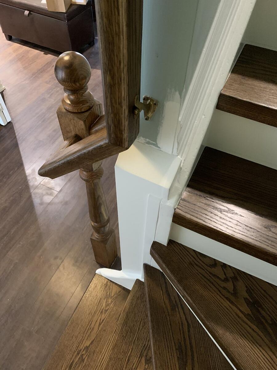 Custom hardwood staircase with wooden railings