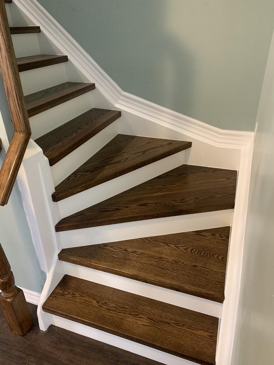 Custom hardwood staircase with wooden railings