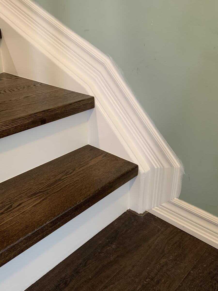 Custom hardwood staircase with wooden railings