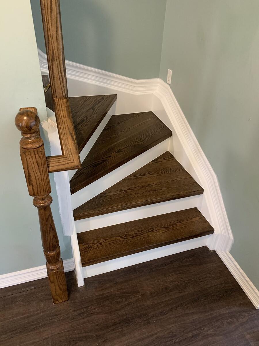 Custom hardwood staircase with wooden railings