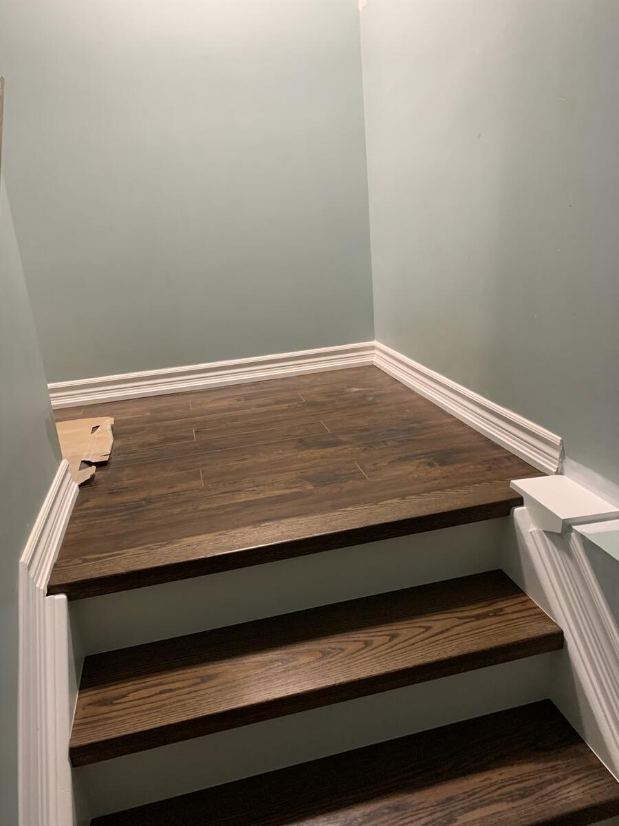 Custom hardwood staircase with wooden railings