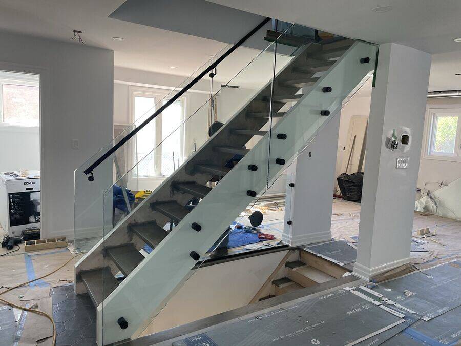 Custom hardwood staircase with wooden railings