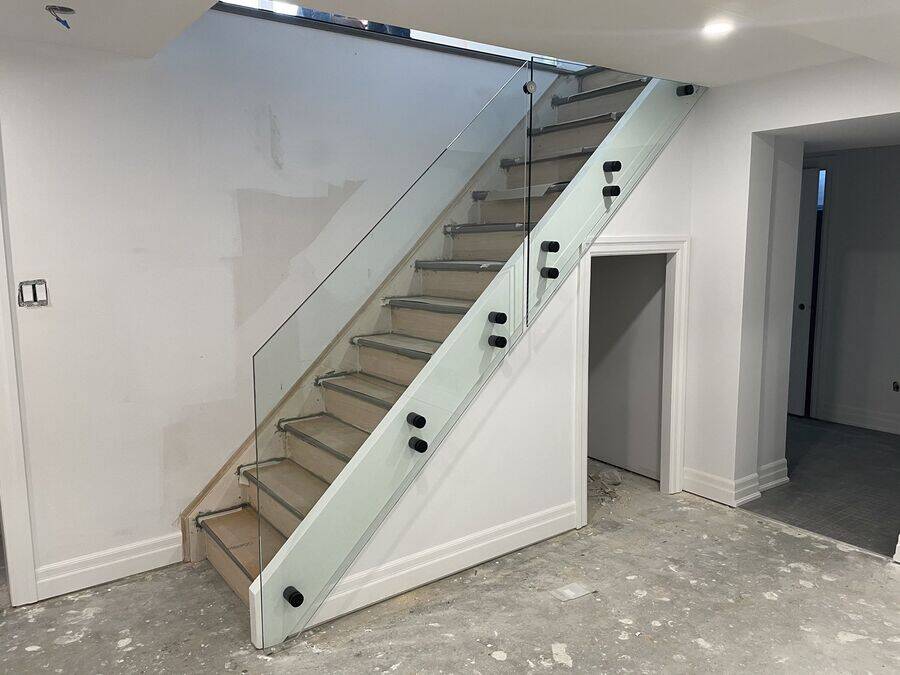 Custom hardwood staircase with wooden railings